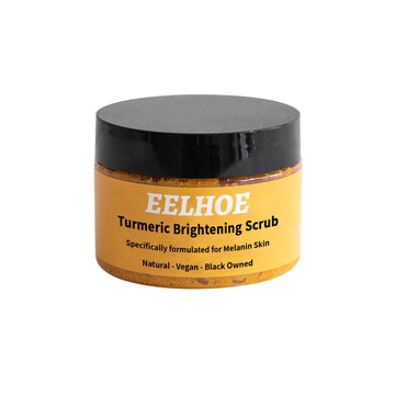 Jar of turmeric sea salt body scrub beside its product box