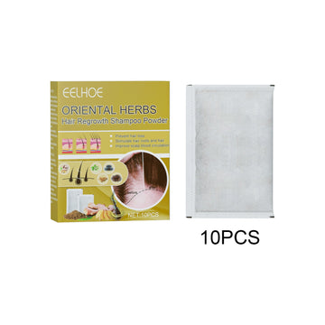Ginger herbal shampoo powder carton marked 10 pieces beside a sachet